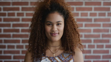 portrait beautiful mixed race woman looking confident successful student with frizzy hairstyle slow motion