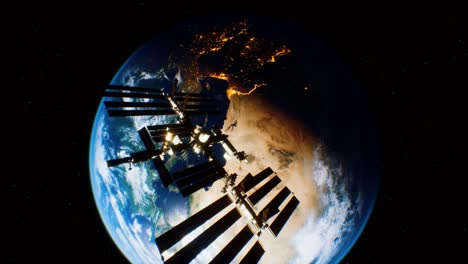 international space station in outer space over the planet earth orbit