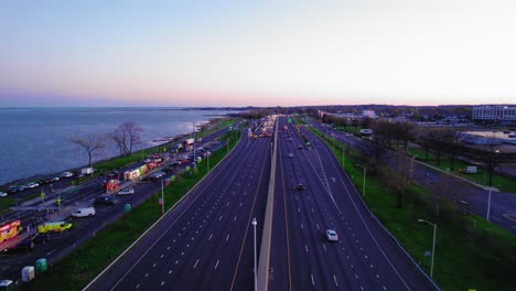 Aerial-view-of-Impact-attenuator-trucks-on-I-95-in-New-Haven,-CT,-United-States