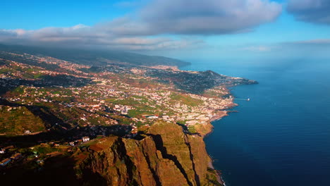 splendid scenery of an inhabited area on the rocky valley. spectacular view of the coast of the madeira islands, portugal from top.