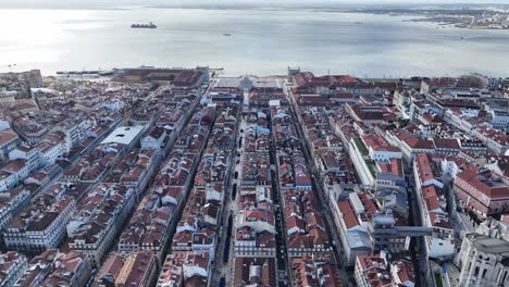 drone shot over central lisbon and the river