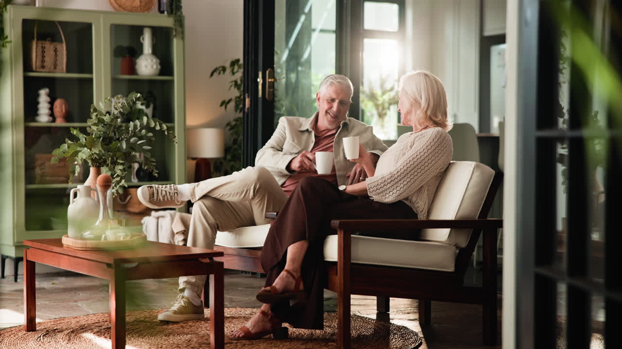 Senior Couple Enjoying Coffee and Conversation in Cozy Home