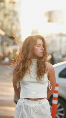 young woman in a city street