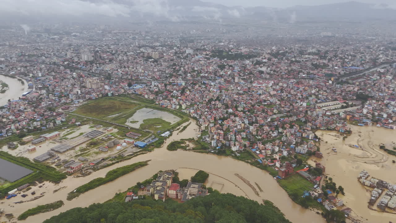 Unmanaged urbanization at Kathmandu Valley Nepal leads to destruction of lives and infrastructures due to sudden flood of Bagmati river by cloud brust and climate crisis drone shot reveals disaster