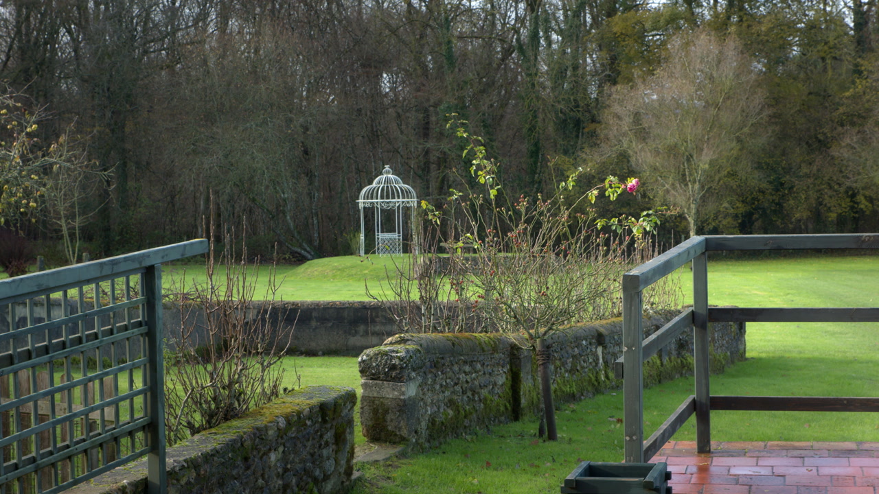 View Of A Garden With Decorative Gazebo - Wide Shot