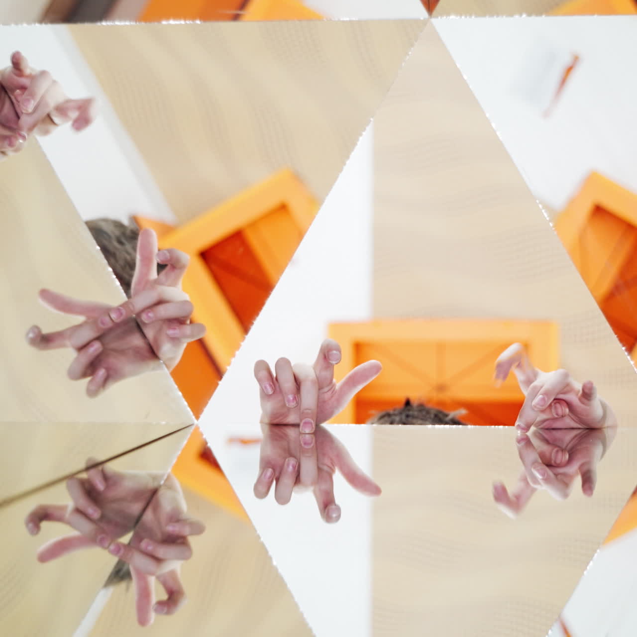 World of reflections of child. Child in a kaleidoscope tunnel. Museum of Science