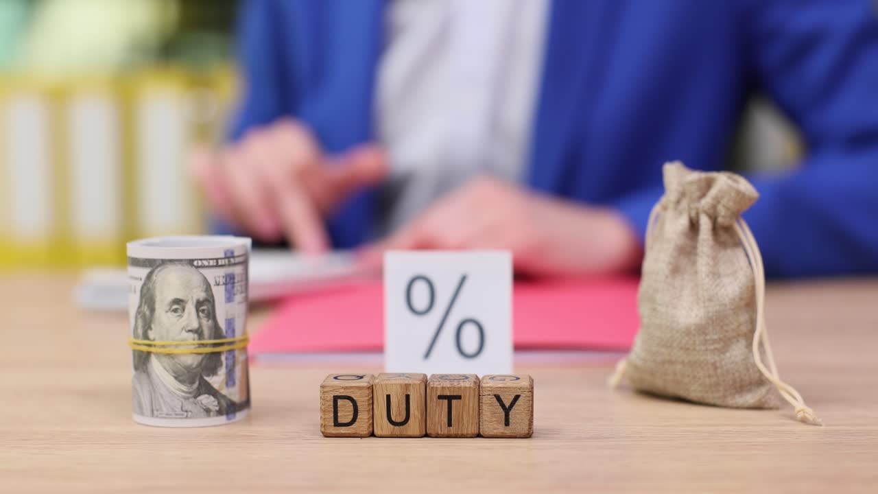 Duty and Tax Concept with Money and Percentage Sign