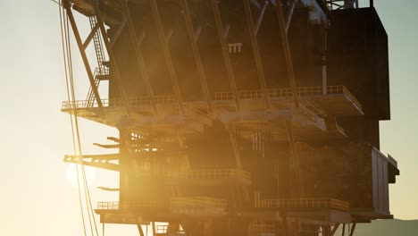 image of oil platform while cloudless day.