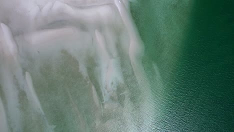 beautiful aerial top down of white sand beach