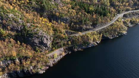 Road-E16-exit-Hettetunnel-at-Stanghelle-Norway,-Autumn-aerial-looking-down