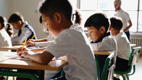 students focused on their work in an elementary school classroom