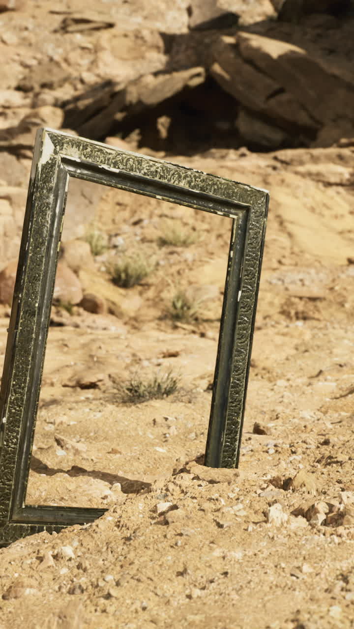 Natural frame among rugged terrain in a remote desert landscape at midday