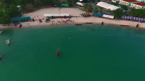 aerial boat teams in rowing competitions in bay of tropical island