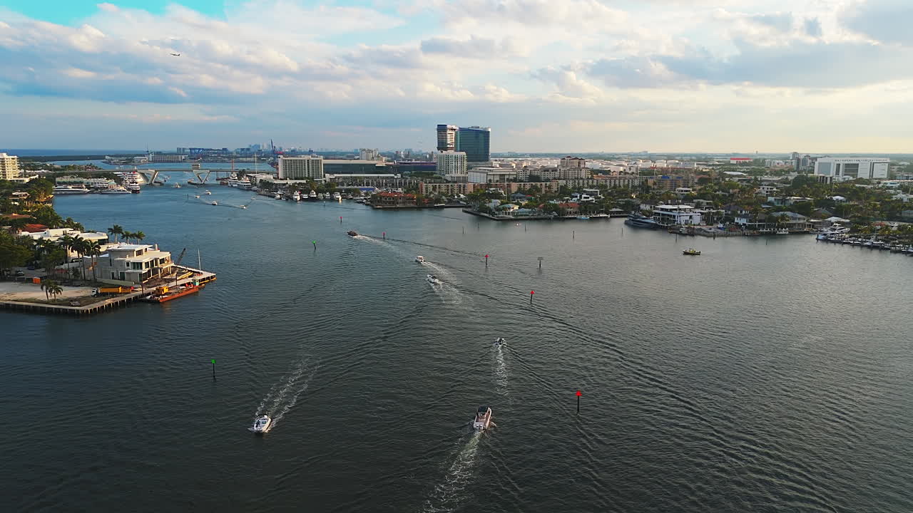 Fort Lauderdale Coastal City, Stranahan River Waterway And 17th Street Causeway Bridge In Broward County, Florida, USA. - aerial shot