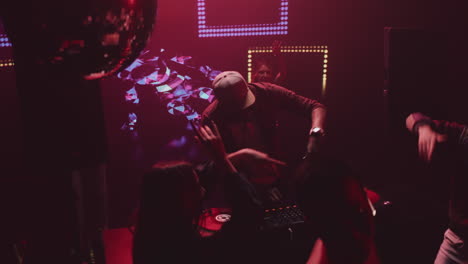 nightclub party with dj