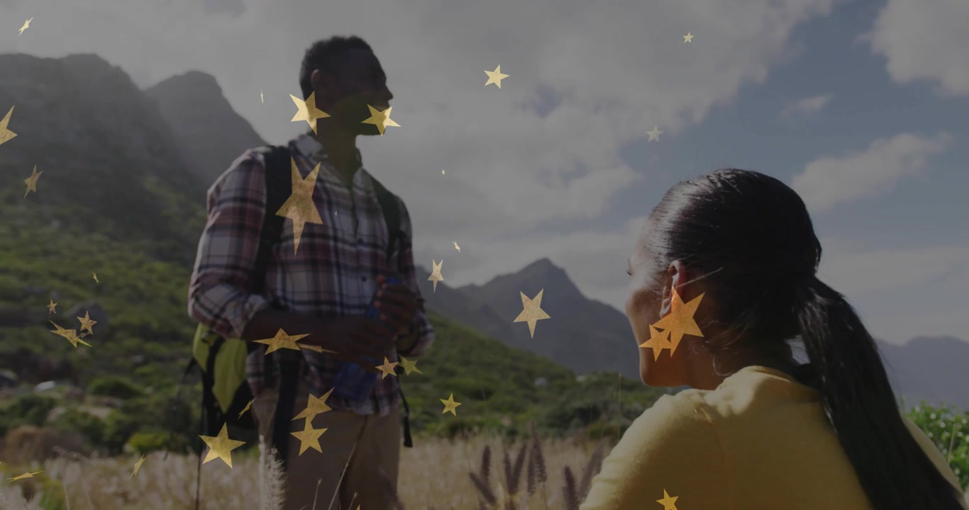 Woman turning head activating animated stars around hikers while man hydrating for health