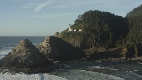 aerial moving in toward haceta head lighthouse