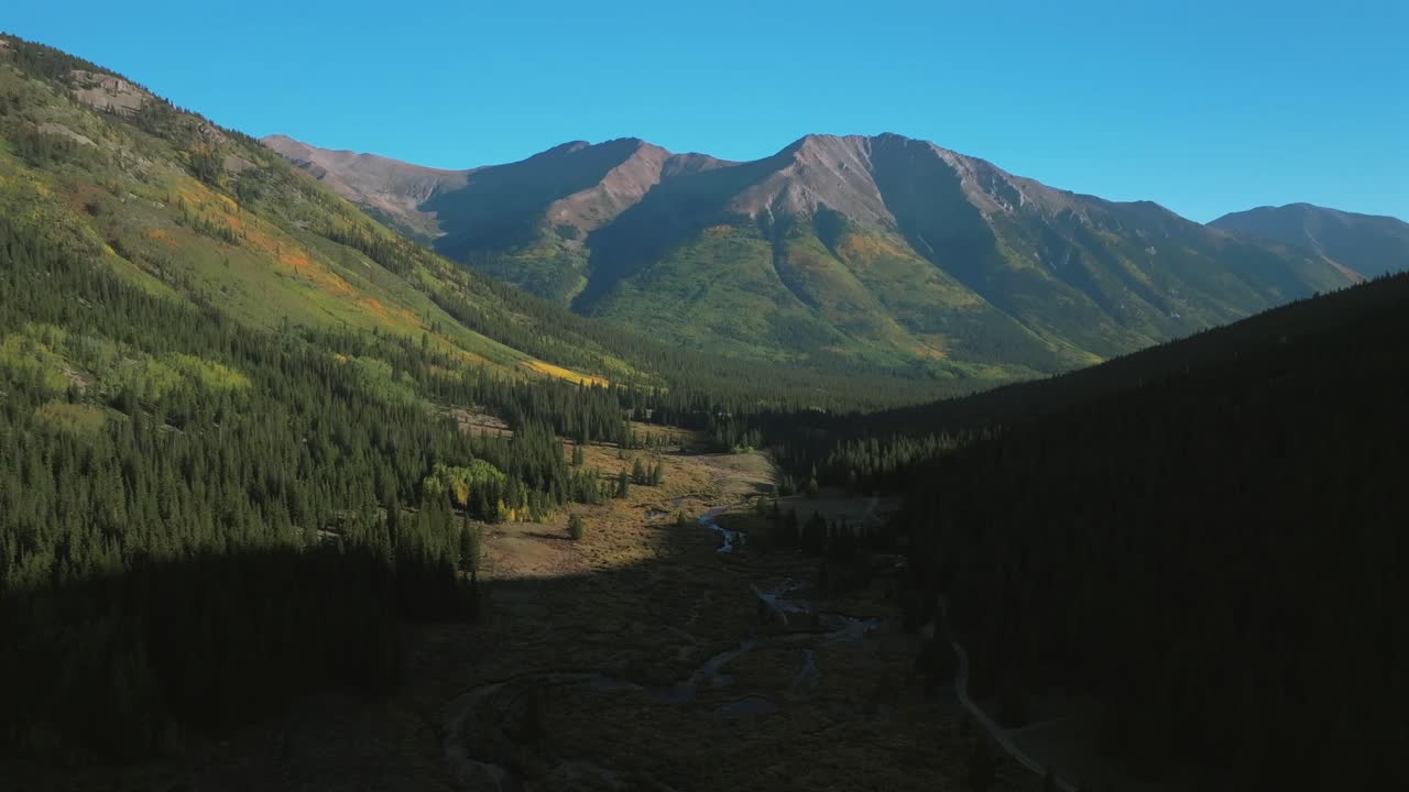 Aerial View of a Mountain Valley in Autumn