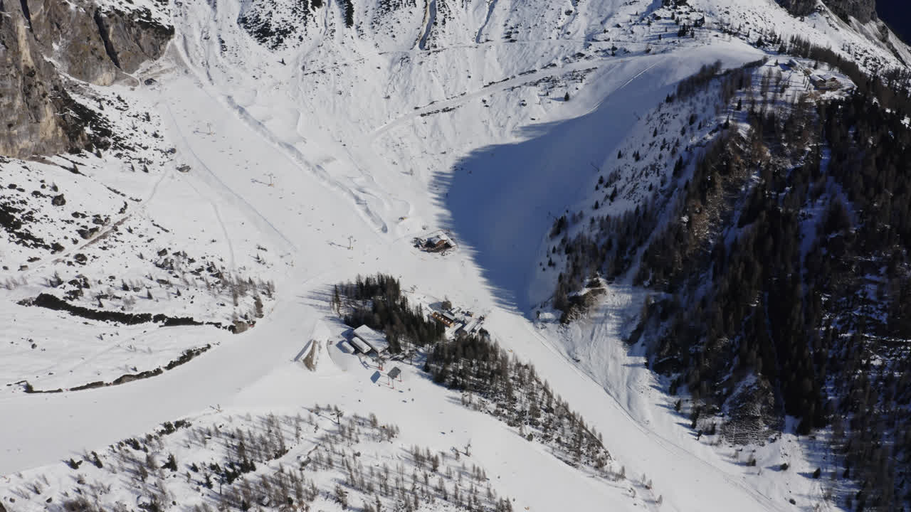 Winter Wonderland With Skiers On The Slopes Of Dolomites Ski Resort In Italy