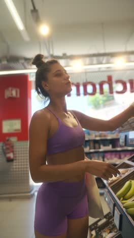 woman shopping for groceries in activewear