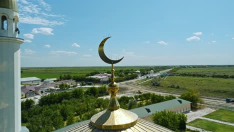 arystan bab mausoleum featuring the crescent moon design, kazakhstan - close up