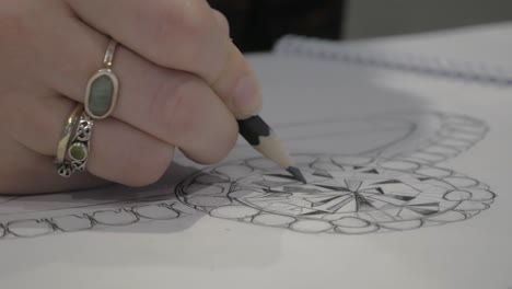 close up designing a custom wedding ring sketch 5