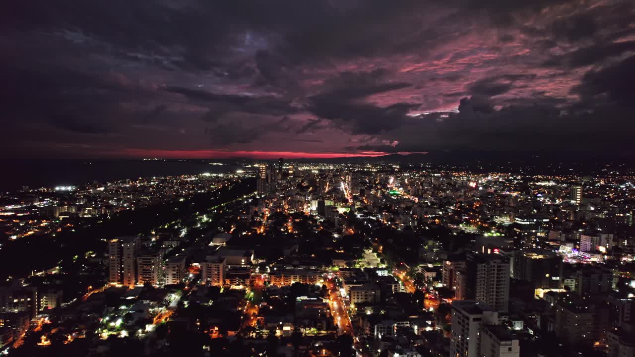 Aerial of Majestic Vivid Sunset Lights over Santo Domingo City