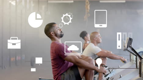 animation of business icons over diverse sports people using rowing machines at gym