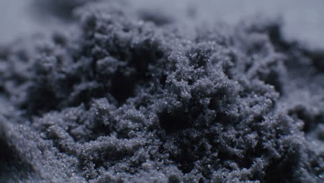 close-up view of dark sand