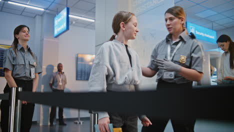 airport security checkpoint with a minor