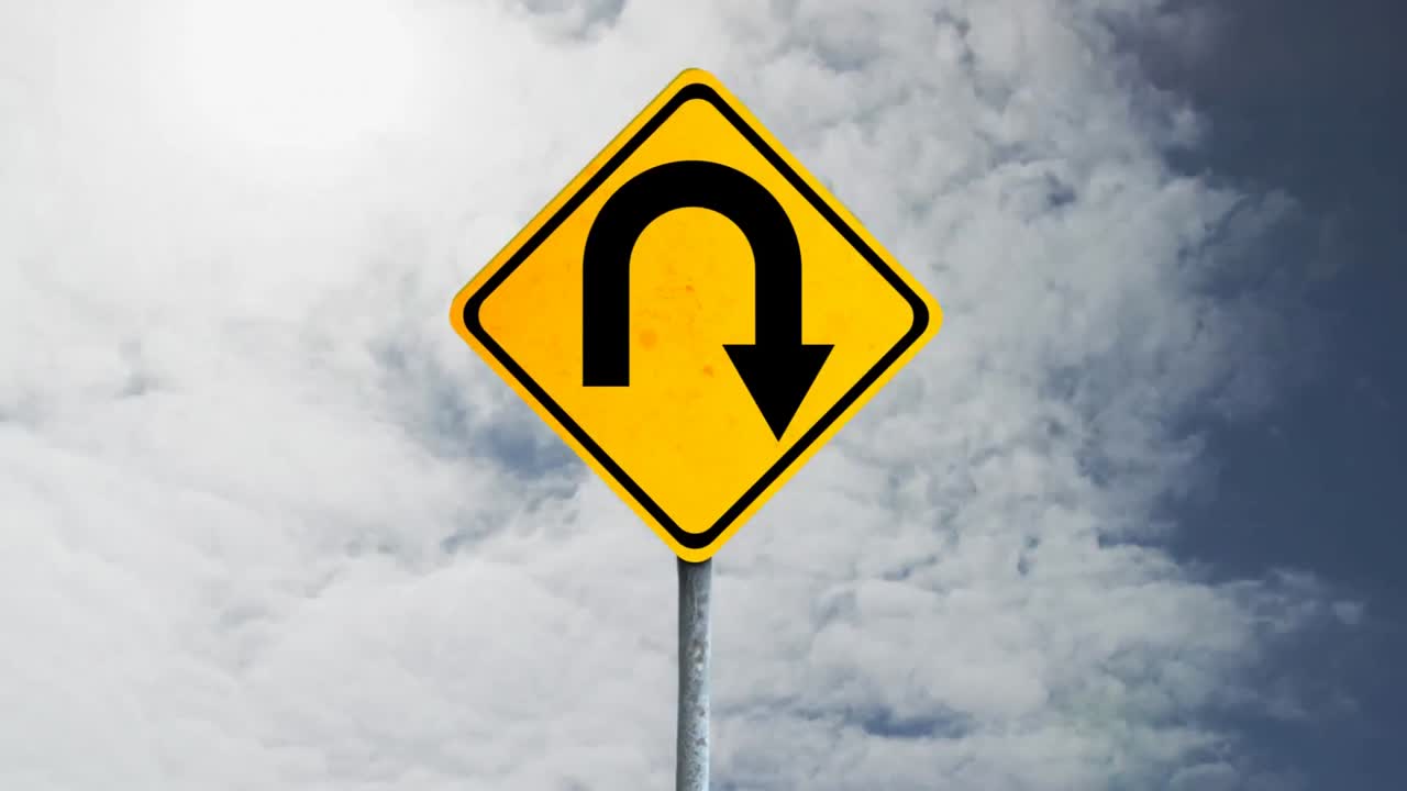 animación de una señal de tráfico amarilla con el cielo en el fondo