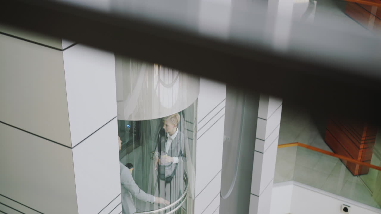 Business People in Elevator