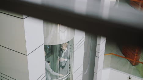 business people in elevator