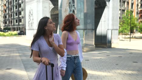 two friends sightseeing in a city