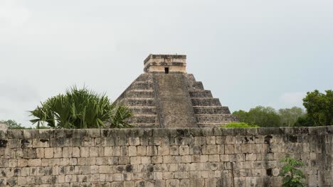 famous temple of kukulcan (el castillo) at chichen itza archaeological site in a cloudy day
