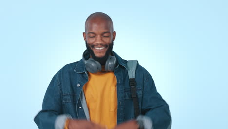black man, headphones and celebration in studio