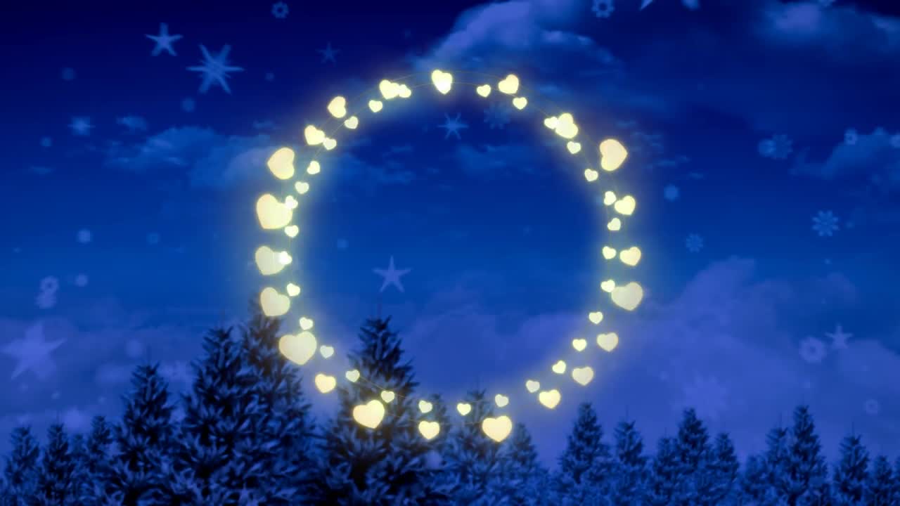 Animation of fairy light frame with copy space over fir trees and winter scenery