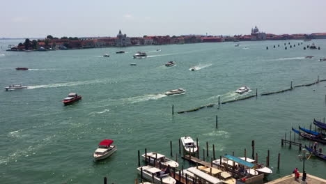 venice, italy wide grand canal, pan to madonna della salute dome, near doge palace and st