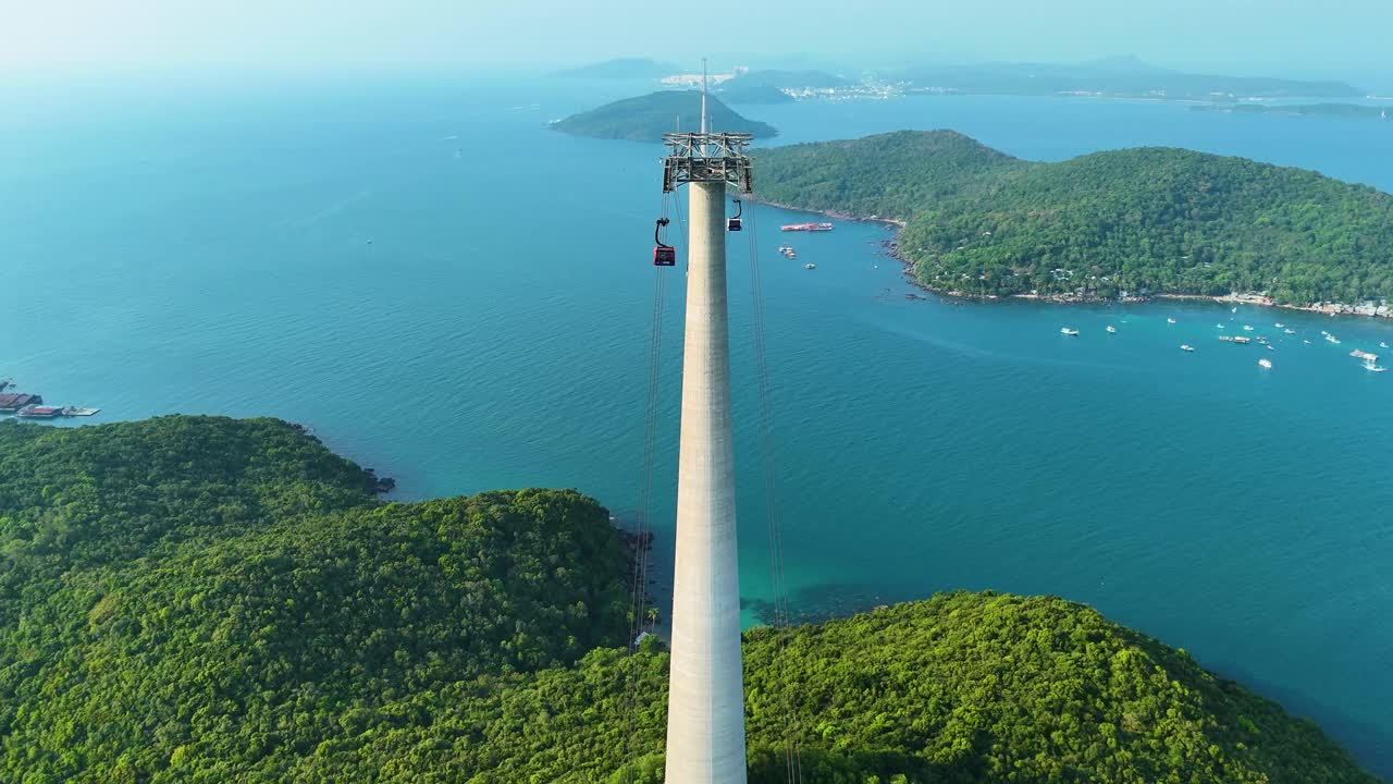 Drone view of the world's longest three-rope cable car in the world during the day in Sunset Town, Phu Quoc Island, Vietnam