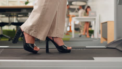 Feet,-walking-and-treadmill-with-a-business-woman