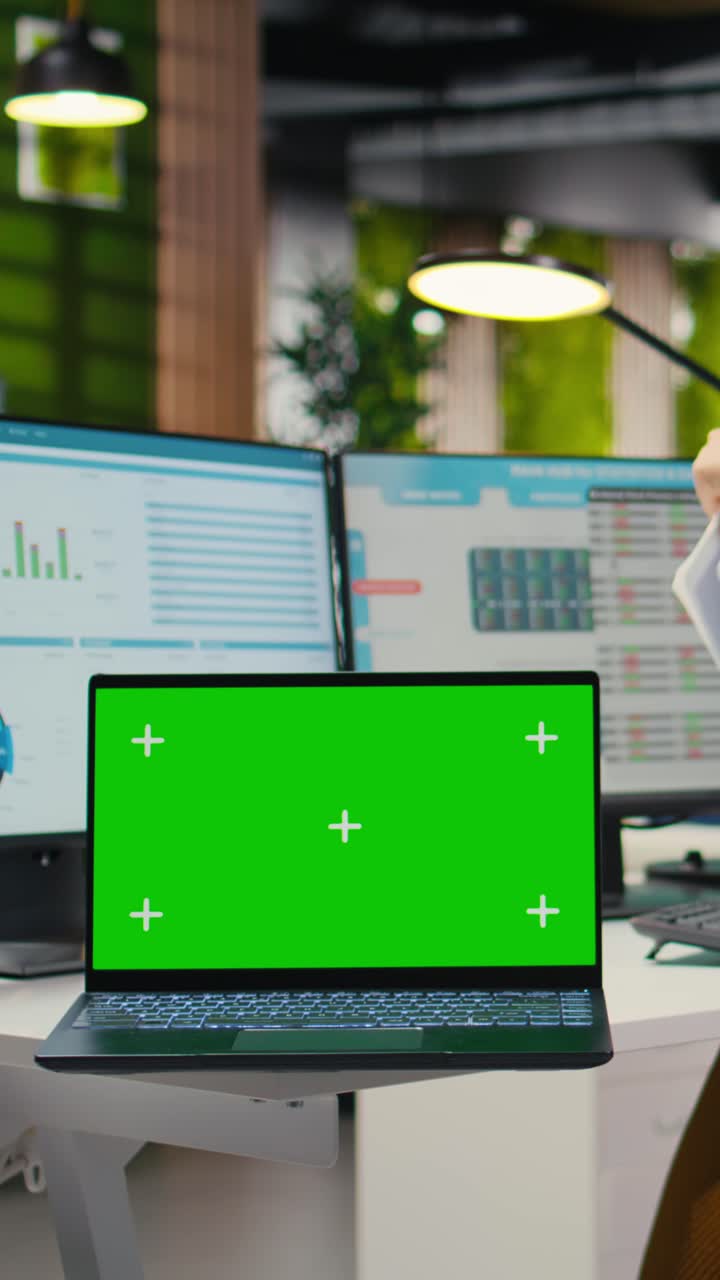 Vertical Video Woman business analyst reviewing forecasts with a copy space