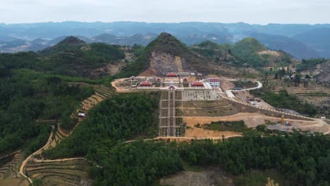 Beautiful aerial footage of the temple Ch&ugrave;a L&agrave;ng Phật Lũng C&uacute; in Vietnam