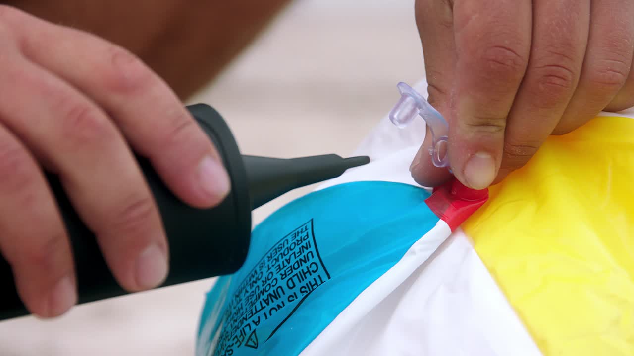 Pumping the beach ball