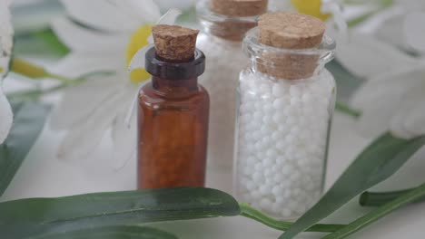 homeopathic medicine bottles with daisies