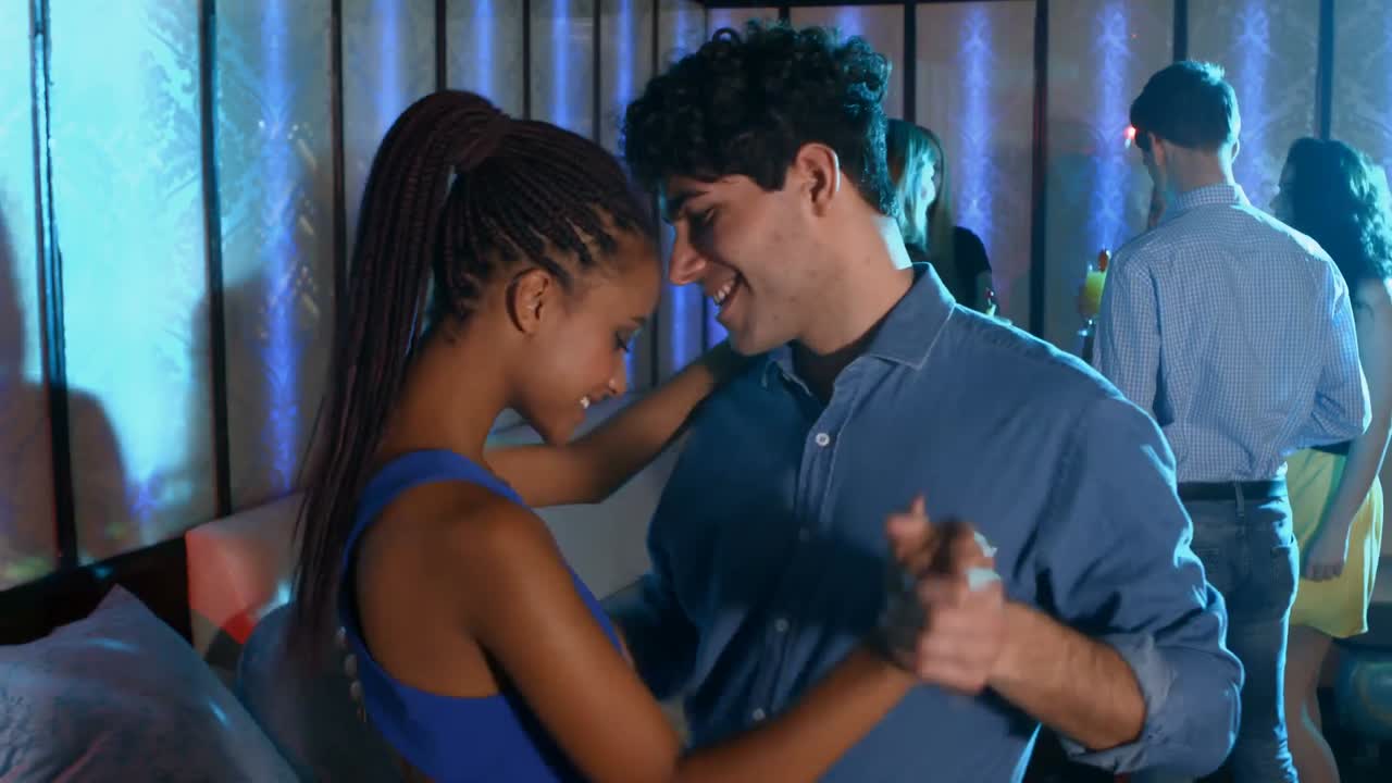 Romantic couple dancing on the floor