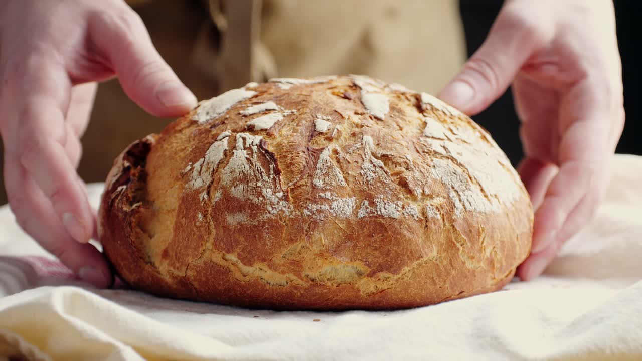 Artisan Bread Being Held
