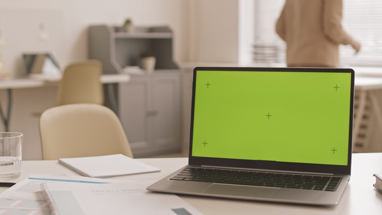 Chromakey on Laptop in Busy Office