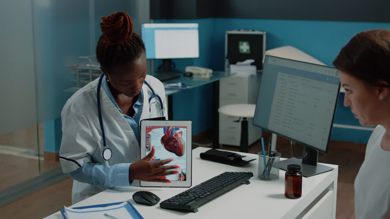 Doctor Explains Heart Anatomy to Patient