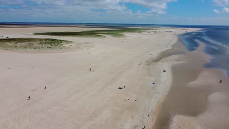 beautiful sand beach and summer sun with ocean on coast of denmark