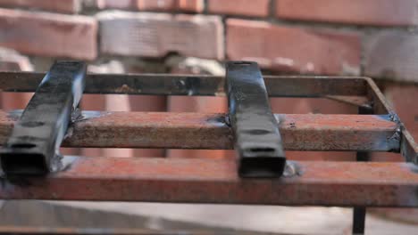 close-up of welding a metal frame